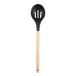 Black silicone slotted spoon with wooden handle for straining and serving food.