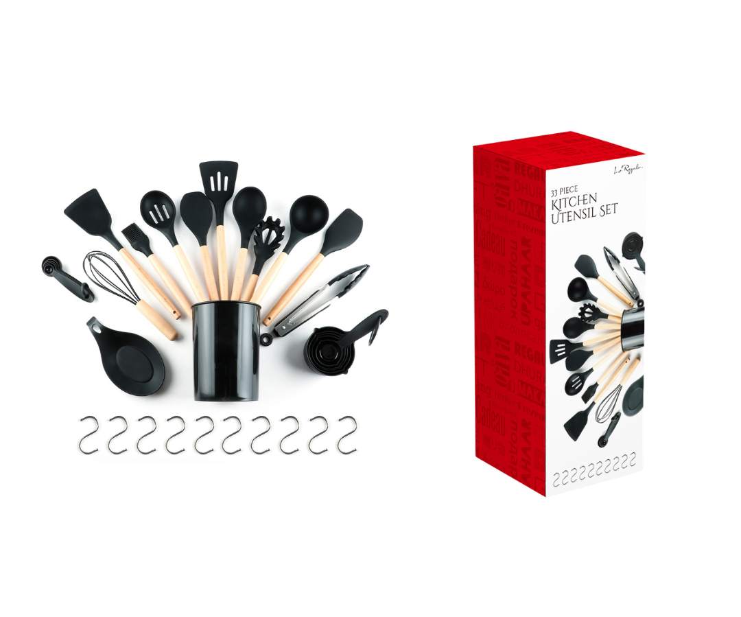 Le Regalo 33-piece kitchen utensil set displayed beside its retail packaging, featuring black silicone tools with wooden handles and accessories.