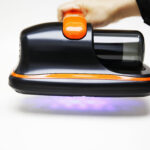 American Builder cordless mattress vacuum operating with UV light sterilization technology