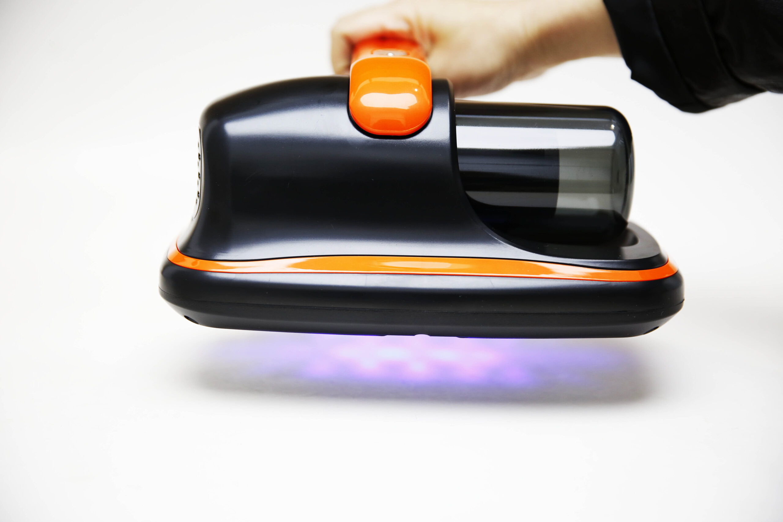 American Builder cordless mattress vacuum operating with UV light sterilization technology
